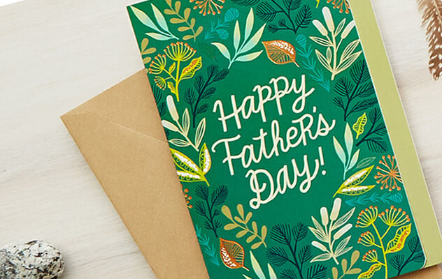 Green card with Happy Father's Day!' on the front and a brown envelope
